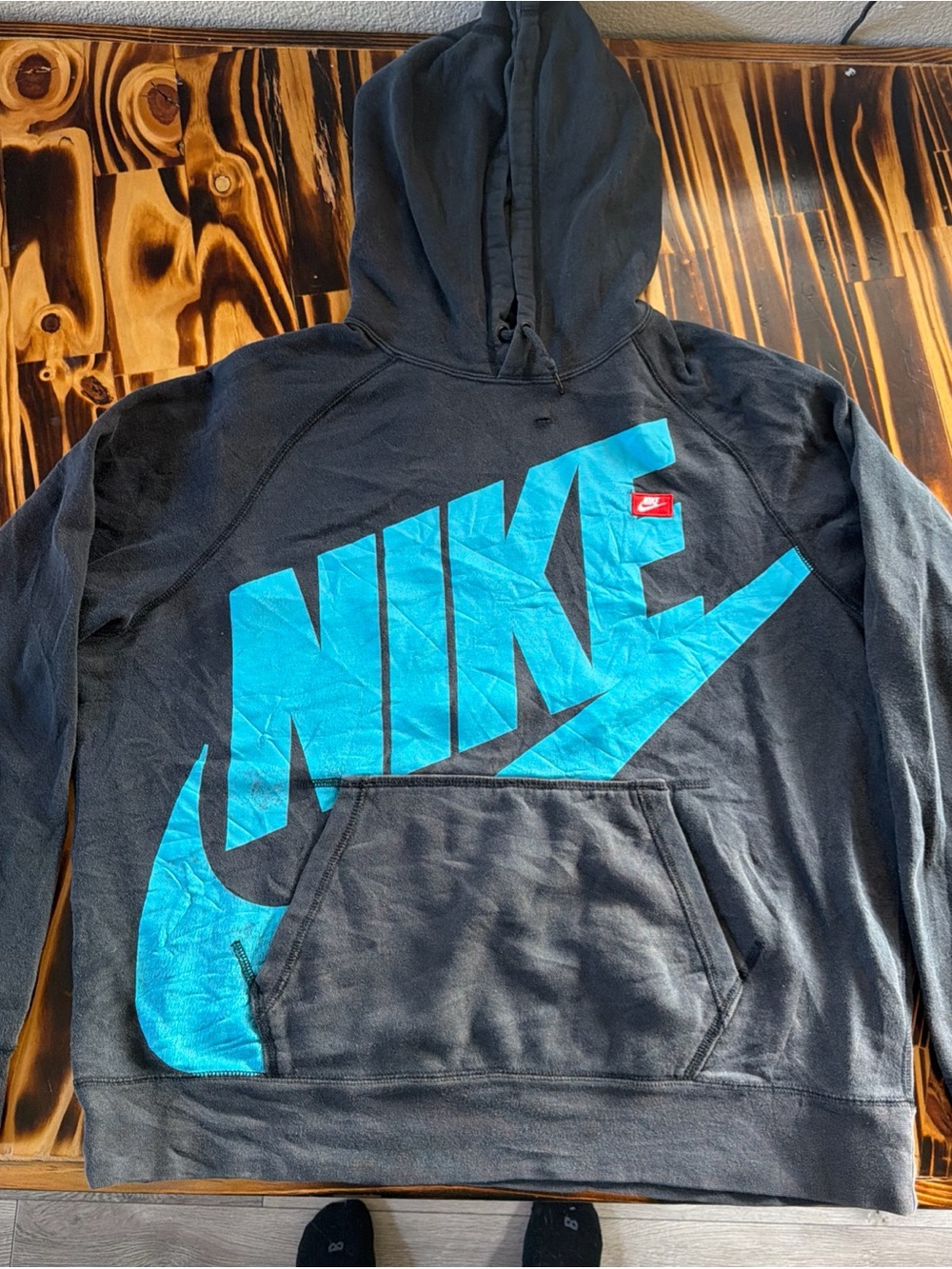 Nike Men's Black Crewneck Hoodie with Large Blue Logo